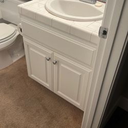 Bathroom Tub, Cabinet and Toilet