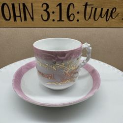 Antique A PRESENT demitasse cup/saucer 