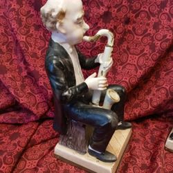 Pair Of Hand Painted Porcelain Figurines With Saxophone/  Clarinet!!