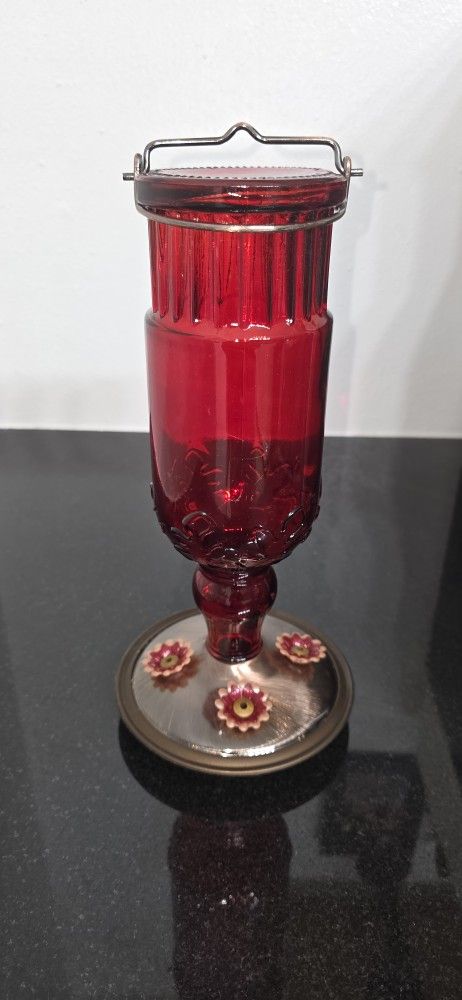 Red antique Hummingbird feeder