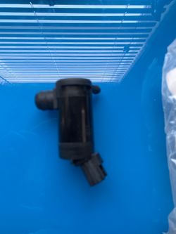 Ford windshield washer pump Part # wg-300 F6sz-17664-ba