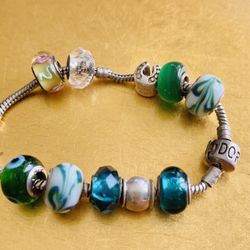 Pandora Sterling Plus 10 Sterling And Glass Beads And Charms 