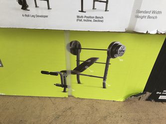Standard adjustable bench with bar and 100 pounds of weight plates