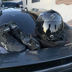 Motorcycle helmet Size L , gloves Size M , and boots Size11 