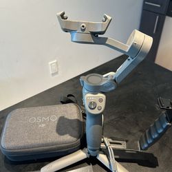 Dji Osmo Mobile 2 with a handle (for light and mic)