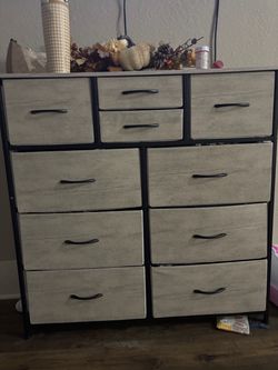 Grey and black fabric dresser