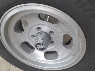 Chevy 15 rims ..old skool.. 80%tires rims 9/10