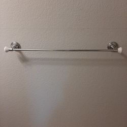 Light, Towel Bar, Hand Towel Ring And Toilet Paper Holder.