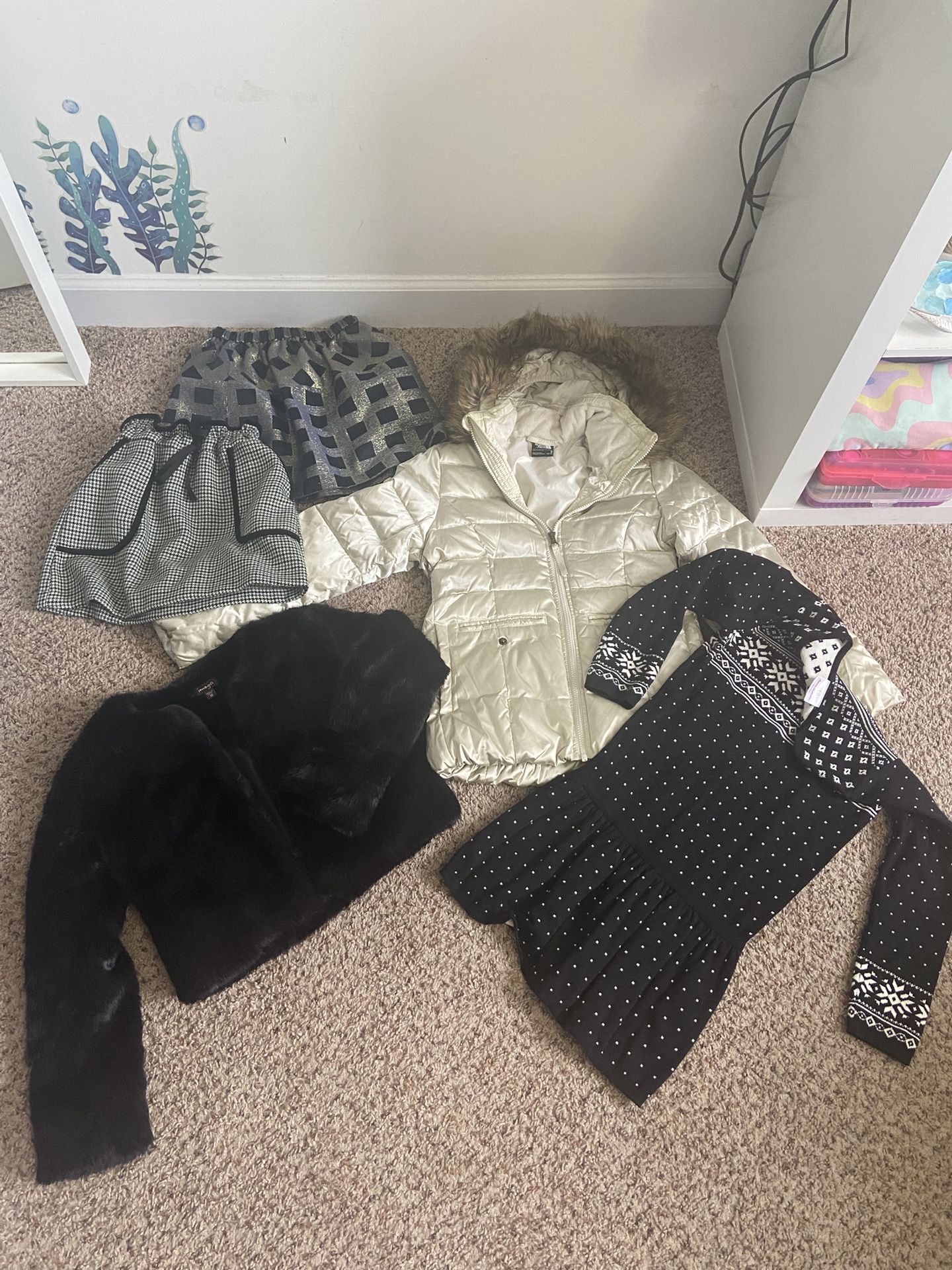 The North Face girls jacket on beige size 10/12 And More Gifts