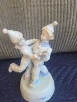 Vintage porcelain clown fingurine