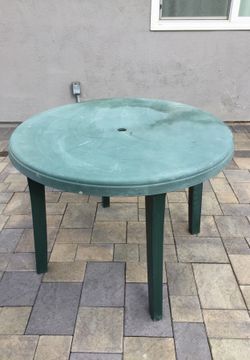Green patio umbrella table