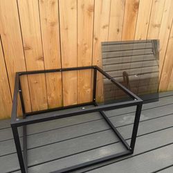 Glass table with metal frames