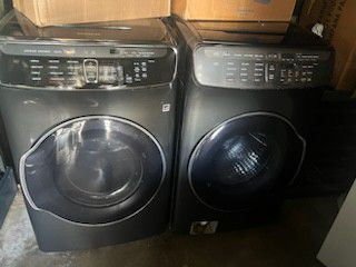 Samsung electric front load double washer and double dryer with 3 month warranty free delivery in the Oakland area outside the Oakland area there a ch