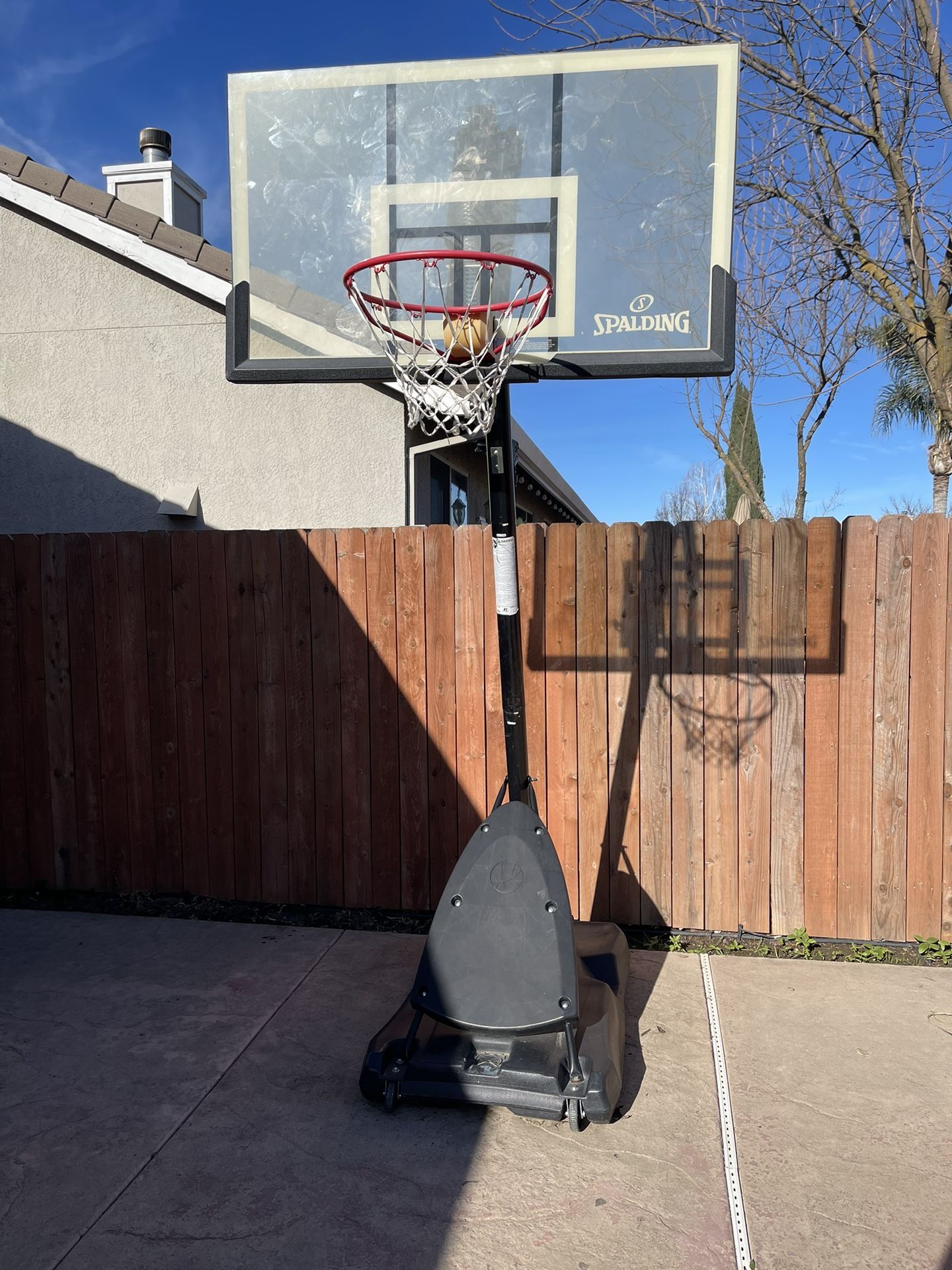 Spalding 54 In. Shatter-proof Polycarbonate Exacta height® Portable Basketball Hoop