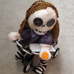 Haunted Rag Doll on Tricycle Spooktacular Animated Halloween Decor to Thrill
