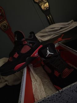 Red Thunder Jordan 4s