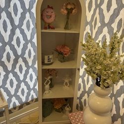 White cabinet with glass door