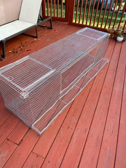 Quail cage with egg roll out tray