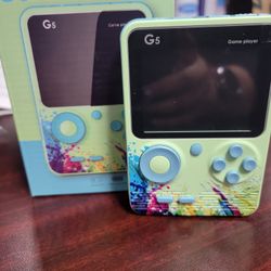 PORTABLE HAND HELD GAMING DEVICE