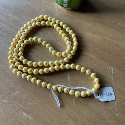 genuine Long Strand of Pearls 36”. These are real pearls color enhanced. Rochester wa