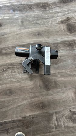 Wheelchair scooter docking lock for van.