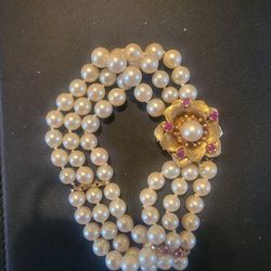 14k gold antique Natural Pearl Braclet with pink saphires.