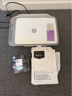 HP printer with ink and paper