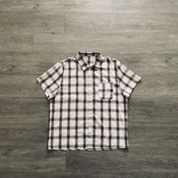 brown and white plaid button-up shirt 
