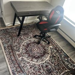 Table Chair And Rug 