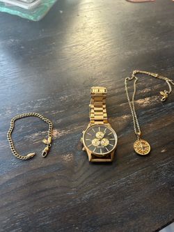 Nixon watch, bracelet, and necklace