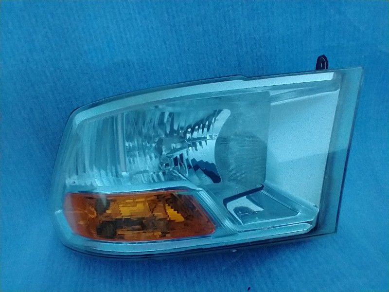 Dodge Ram Passenger Headligh Fits 2010 To 2012 1500 Or 2500 OEM Part