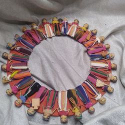 Vintage 14" elite Handmade Guatemalan Worry Doll Wreath Colorful Cloth Folk Art

Pre owned  in an excellent condition 

l