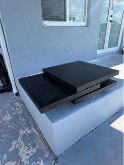 Modern black rotating tiered coffee table