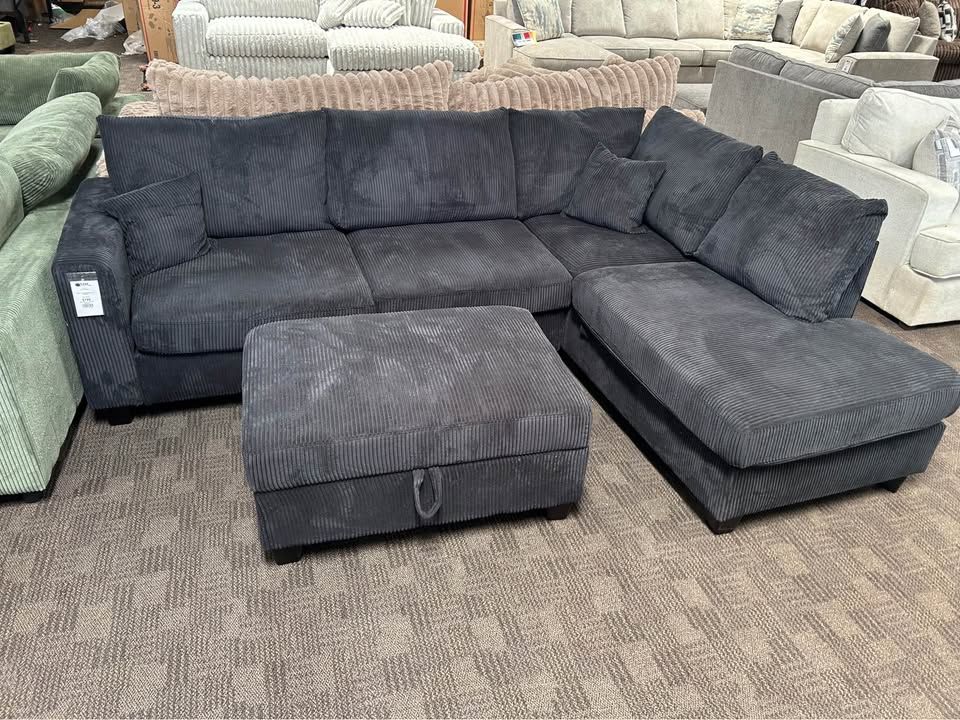Black comfy sectional w/ storage ottoman