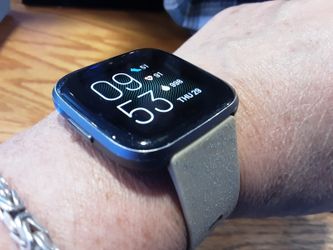 Fitbit Versa 2 Wristband Activity Tracker , Tan and Black (FB507) with Charger