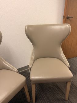 Pair of Taupe Dining Chairs with Tufted Backs & Nailhead Trim