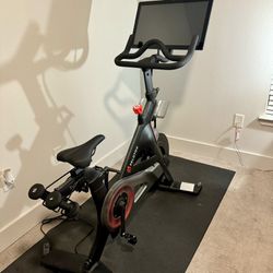 LIKE NEW Peloton Bike with Weights And Floor Mat 