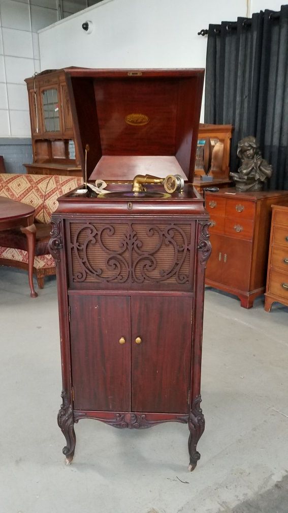 Gorgeous antique Brunswick victrola inornate solid mahogany cabinet with original instructions