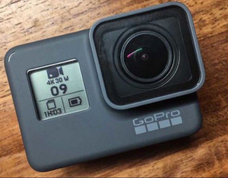 Gopro Hero Black 5 with battery and cable.