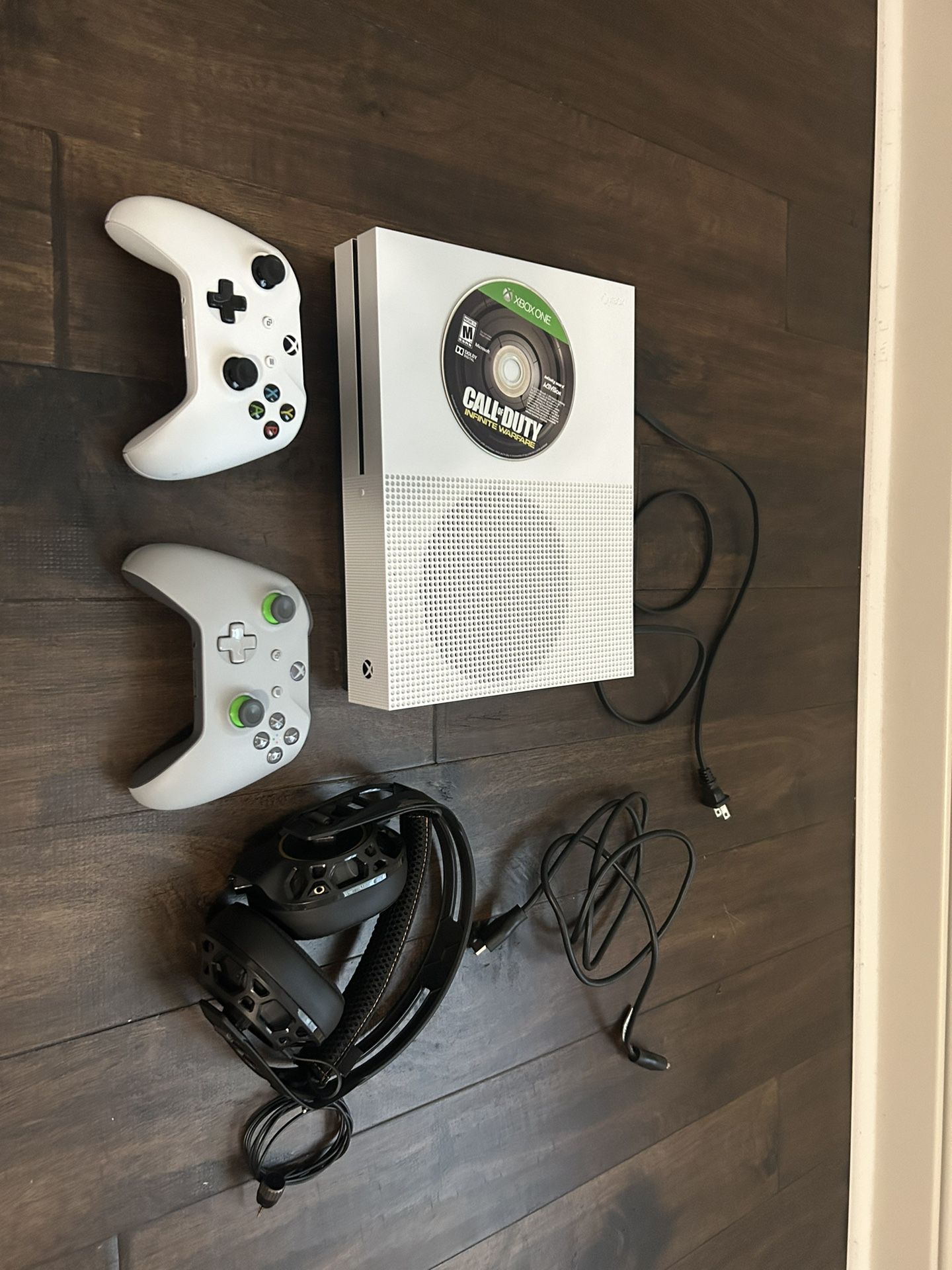 Xbox One S, Two controller’s And  Gaming headset