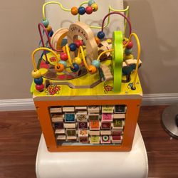 B. Toys Wooden Activity Zany Zoo Alpha Cube