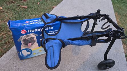 Small dog wheel chair and small dog diapers