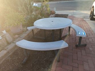 Picnic table with three swinging chairs