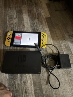 Nintendo switch Pokemon edition with dock and charger