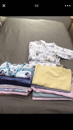 Scrubs for sale 13 tops 5 pants sizes L $60 for all