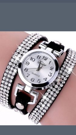 If she likes BLING here it is!!! Black and silver Rhinestone Watch!