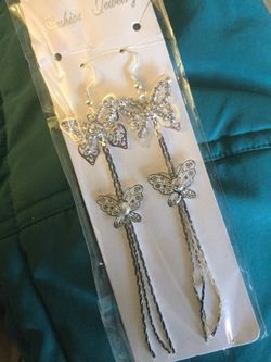 Silver long butterfly earrings with delicate crystals