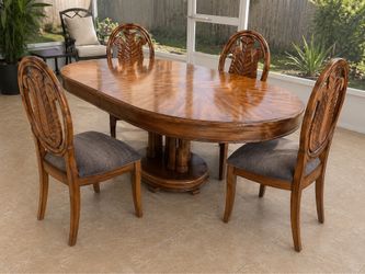 Tommy Bahama styled designer dining set with leaf and 4 tropical themed chairs . Excellent Condition