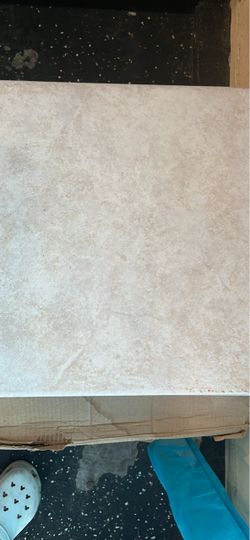 16x16 porcelain tiles.