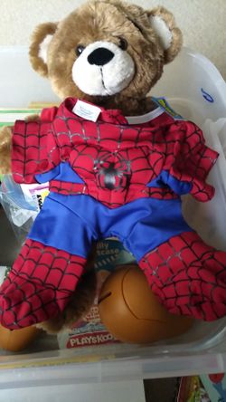 Build a-Bear:includes both outfits (Superman+love is the stuff inside shirts and the Bear.